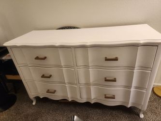White dresser and one side table