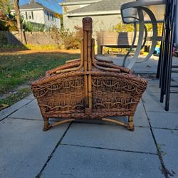 A wicker magazine newspaper basket antique