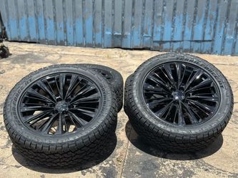 Black Multi-Spoke Wheels with Terra Force AT Tires