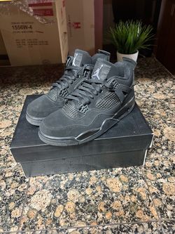 Jordan 4 black cat