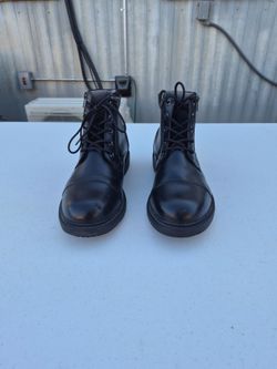 steel toes boots for sale for men size 10 like new just has a scratch on the steel toe  slip in with zipper on each side