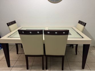 Juego de comedor con 4 sillas y mesa de madera con vidrio