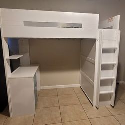Kids loft bed with desk and cabinet attached