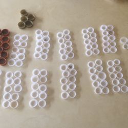 White Water Bottle Caps And Brown Soda Caps