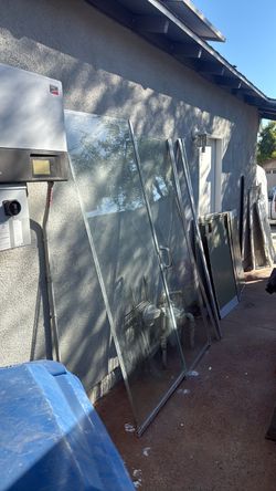 Glass shower door with trim