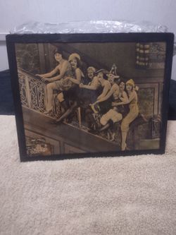 Early days with ladies on a rail.