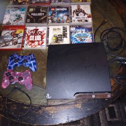 PS3 With 2 Controllers w/charger cord And 12 Games 