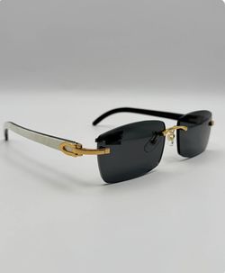 Rimless Buffs sunglasses Detroit style