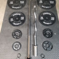 Olympic Weight Set With Olympic Bar & Curl bar..210lbs all together read Description below...