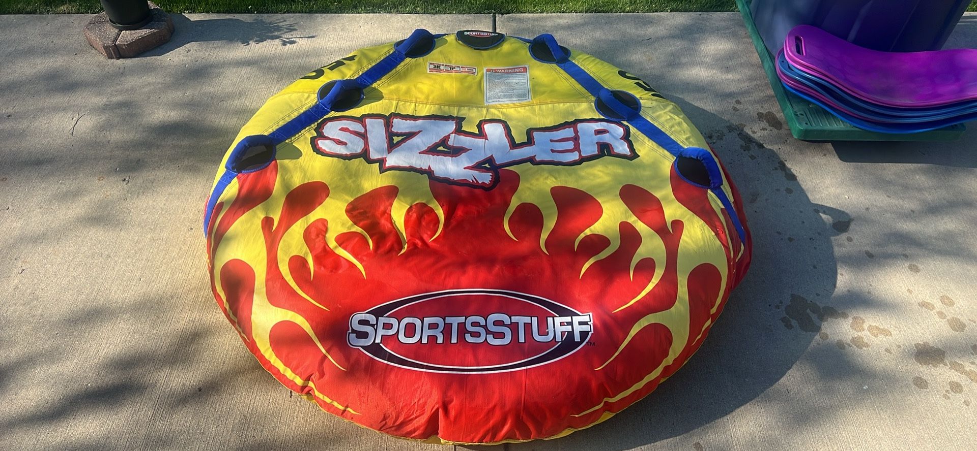SPORTS STUFF SIZZLER 60" BOAT TUBE LAKES RIVERS. Used and in very good shape.  Asking $40 for ALS fundraiser. 
