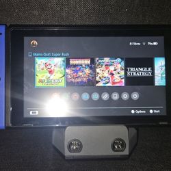 Nintendo SWITCH with Games and Controllers