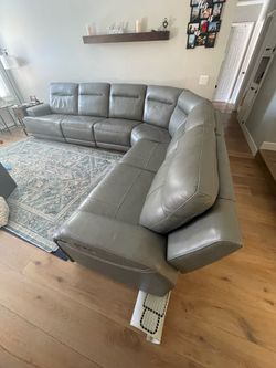 Leather sectional still under warranty! $4,000 obo