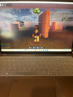 Black Gaming Laptop with Keyboard Cover