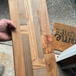 Multi wood wall shelf. Hand made with oak, pin oak, blue fir and cherry wood with a semi gloss finish.