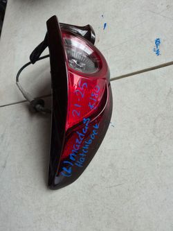 Mazda 3 hatchback left tail light oem