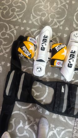 Selling my 40 pound weight vest 16 ounce gloves and kickboxing shins