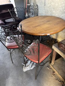 Dining Room Set With Four Iron Chairs And Table