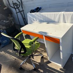White Desk With Orange Drawer And Green Chair