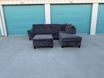Ashley furniture sectional with ottoman retails ;$1500+