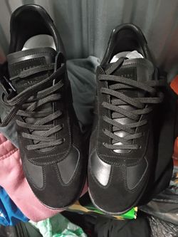 All black and suede sneakers