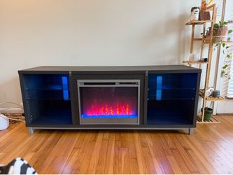 Entertainment center with electric fireplace