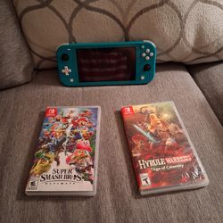 Nintendo switch lite Baby blue with 2 games