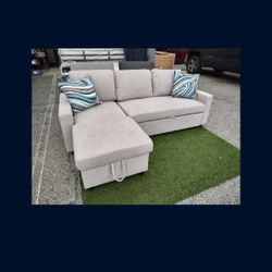 Brand New 
Sectional Pull Out Bed 
Storage Chaise 
Flannellete Fabric 
2 Pillows Included 
Available In Beige, Grey, Black, Red, Green
$459 + Tax 
FRE
