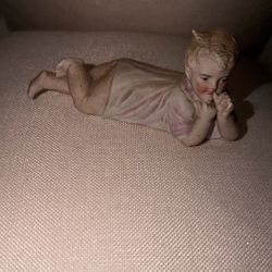 Antique German Bisque Baby Girl Laying Piano Baby Figurine Sculpture