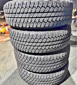 275/60/20 Brisgtone Set de Tires con 80% de vida las 4