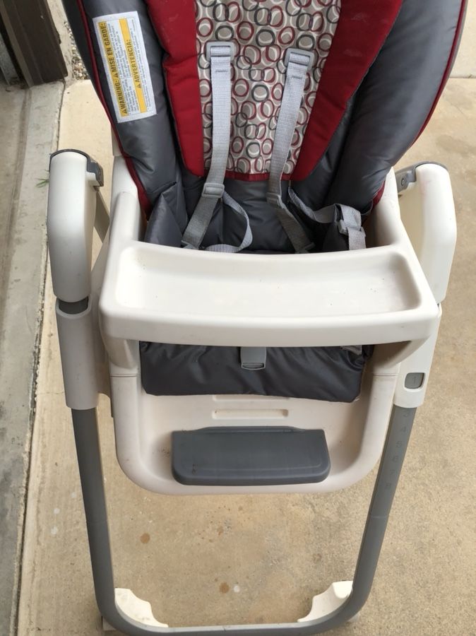 Graco slightly used high chair with three trays