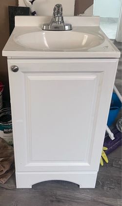 White Bathroom Vanity with Sink and Faucet