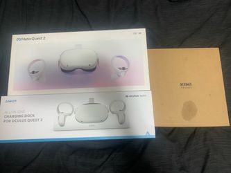 Full oculus quest 2set with chargeable head strap with padding and a charging doc for the head set