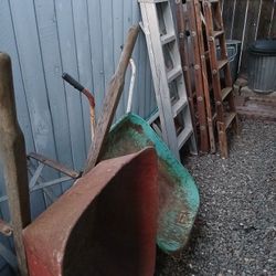 2/Wheelbarrow, 2/wood Ladders, 1/aluminum Ladder, And 1/aluminum Extinction Ladder! Must Go Take All For One BULK PRICE!!!