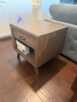 Wood end table with drawer and cubby