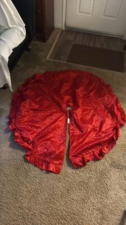 Bright red Christmas tree skirt.
