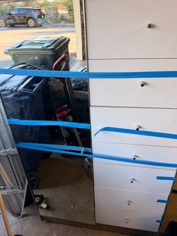 White Tall Dresser with Silver Knobs