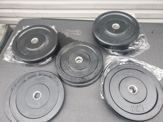 Brand new 260 lb set of bumper plates