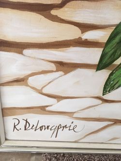 Green and white painting with signature