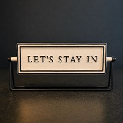 Magnolia Double-Sided “Let’s Stay In / Let’s Go Out” Ceramic Flip Sign