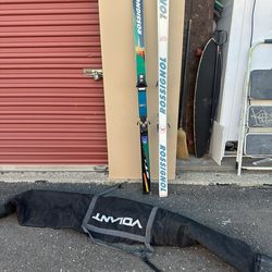 Throwback Vintage Rossignol Skis With Bag