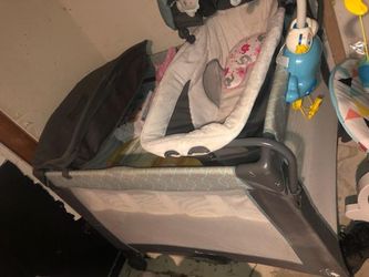 Playpen with bassinet and changing table
