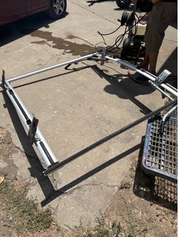 Aluminum drop-down van ladder rack