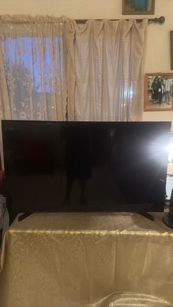 Large Flat Screen TV with Stand