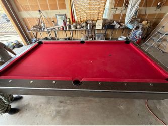 Red felt pool table