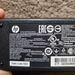 2 HP AC ADAPTER USED