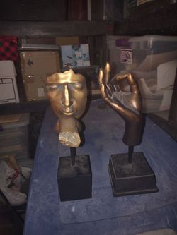 Bronze Buddha hand sculpture and Vitruvian  Bronze Sculpture