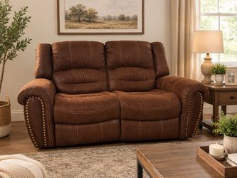 Brown leather recliner like new