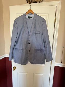 Light blue INC brand suit, size XXL, pants size 38-30, excellent condition.