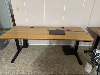 2 lift desks and gaming chair
