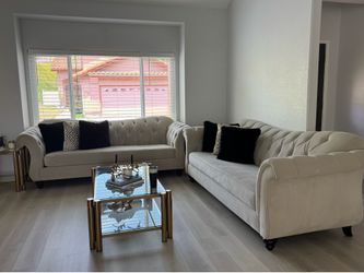 Very good condition velvet ivory sofa’s and velvet black chair (3 sofa’s) one chair all for $1700